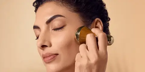 How to Use a Kansa Wand for Sculpted and Radiant Skin